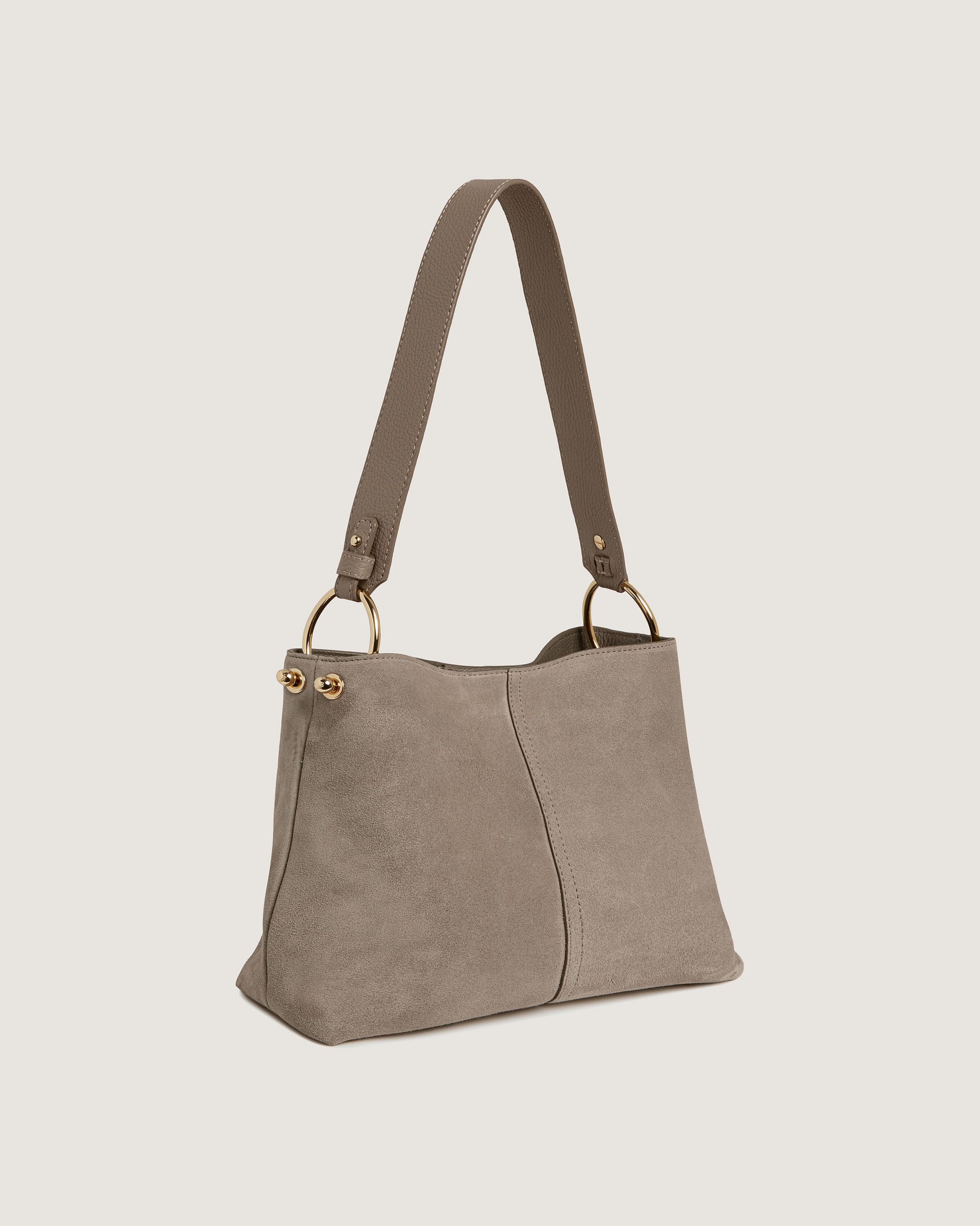 A gray purse with a handle on a white background