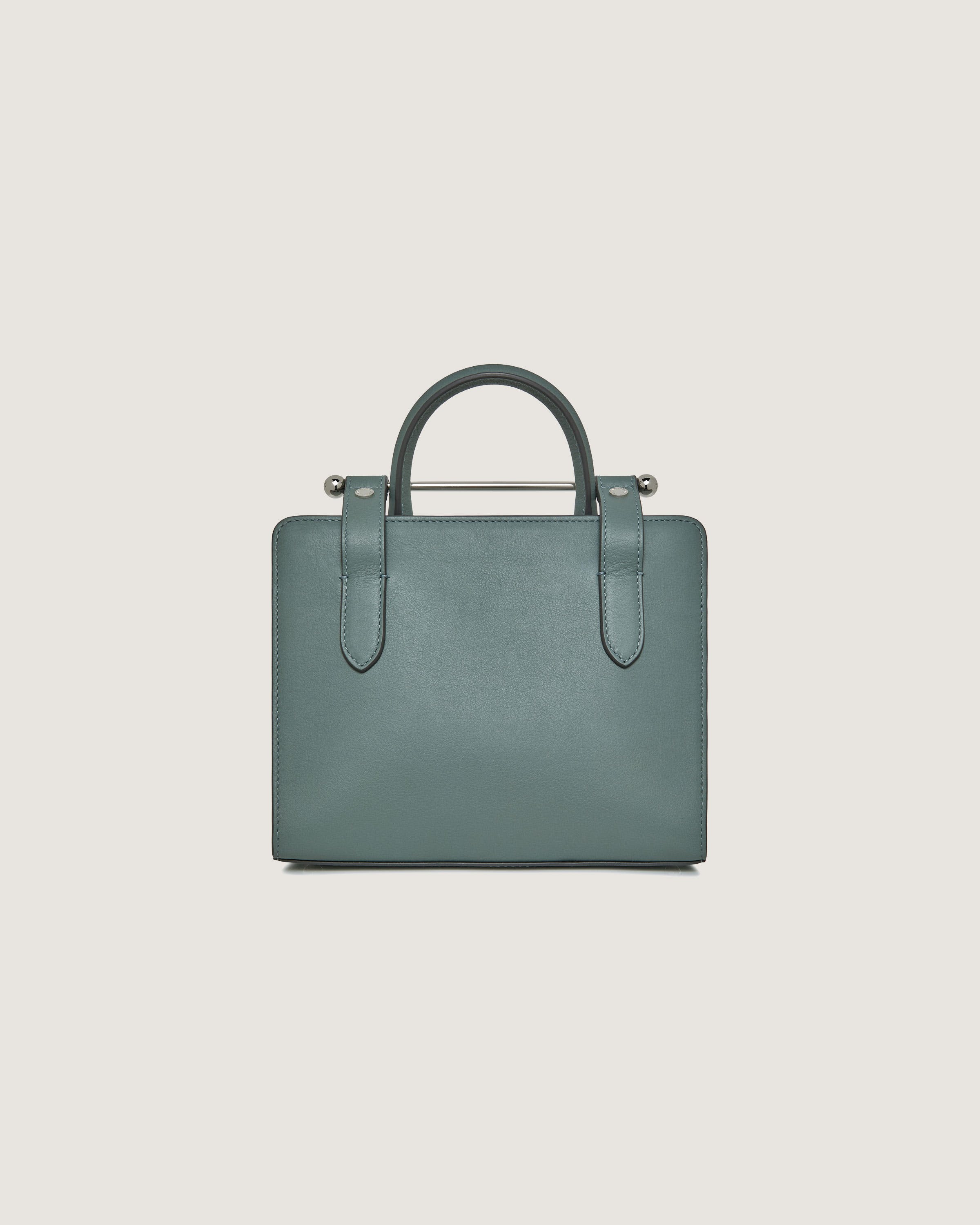 A green leather briefcase on a white background