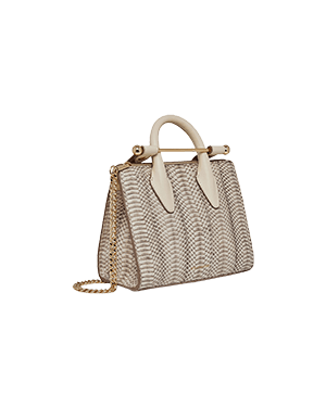 A white handbag with a gold handle