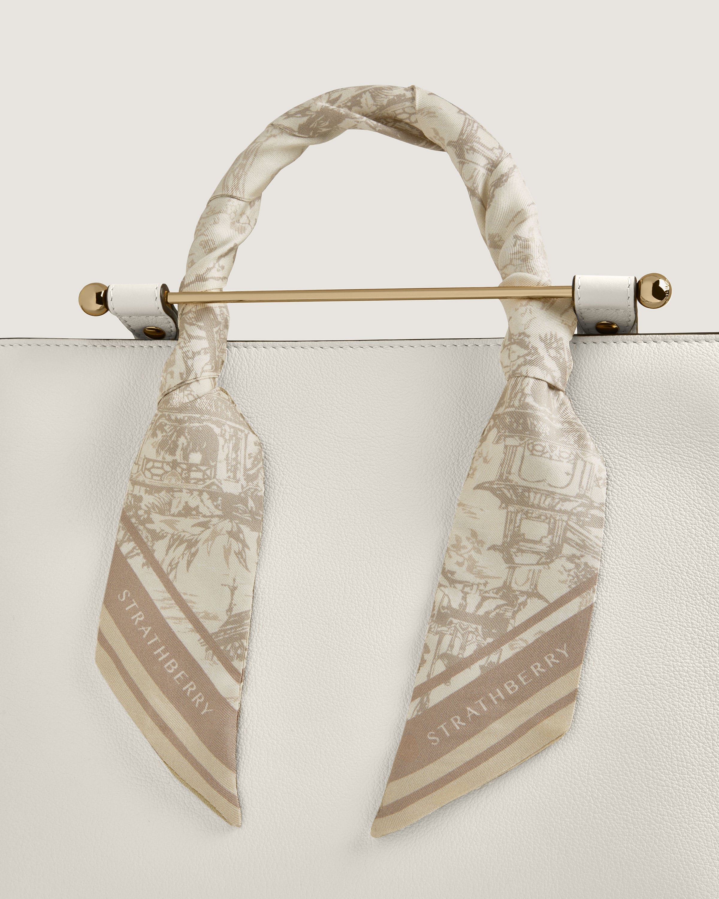 A close up of a bag with a tie on it