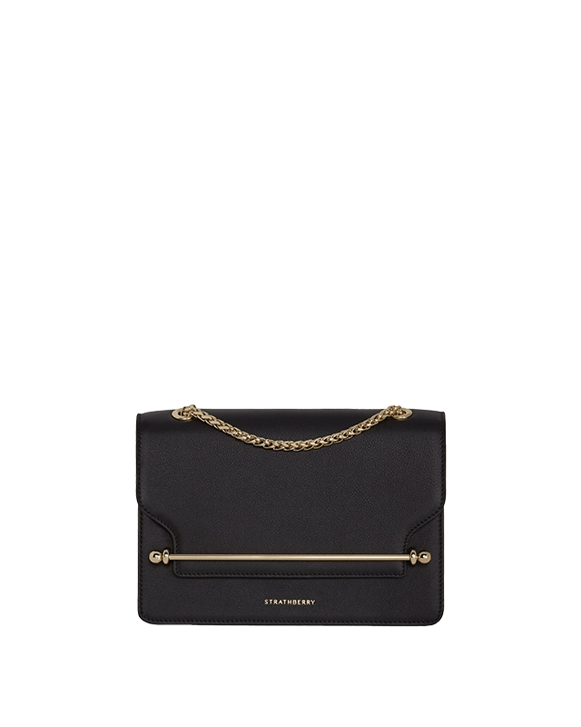 A black clutch bag with a gold chain