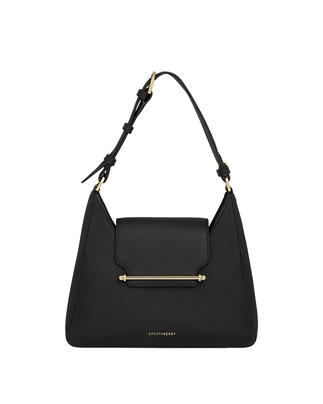 A black handbag with a gold handle