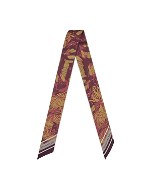 A tie with a red and yellow design on it