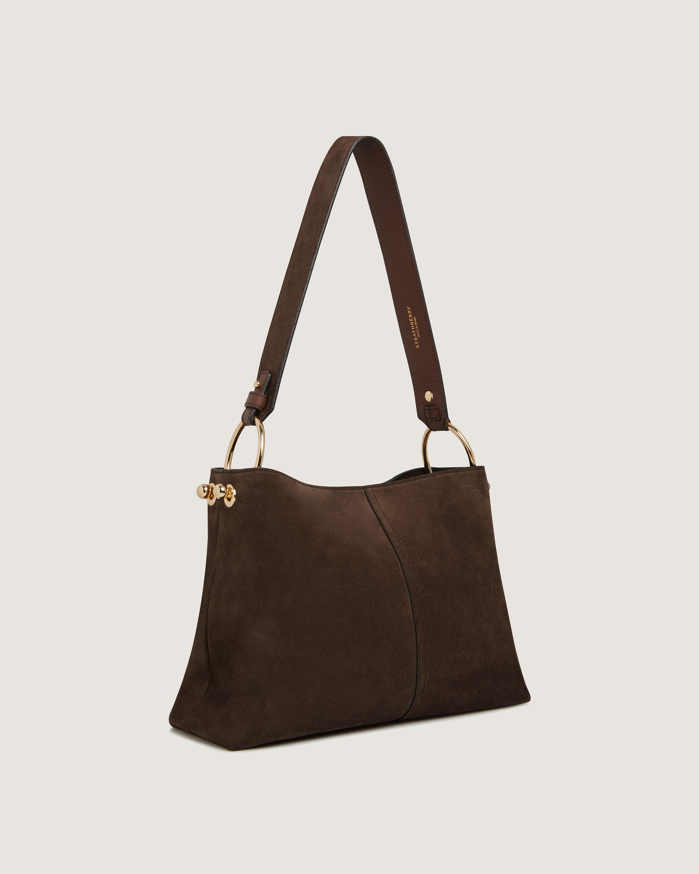 A brown handbag on a white background