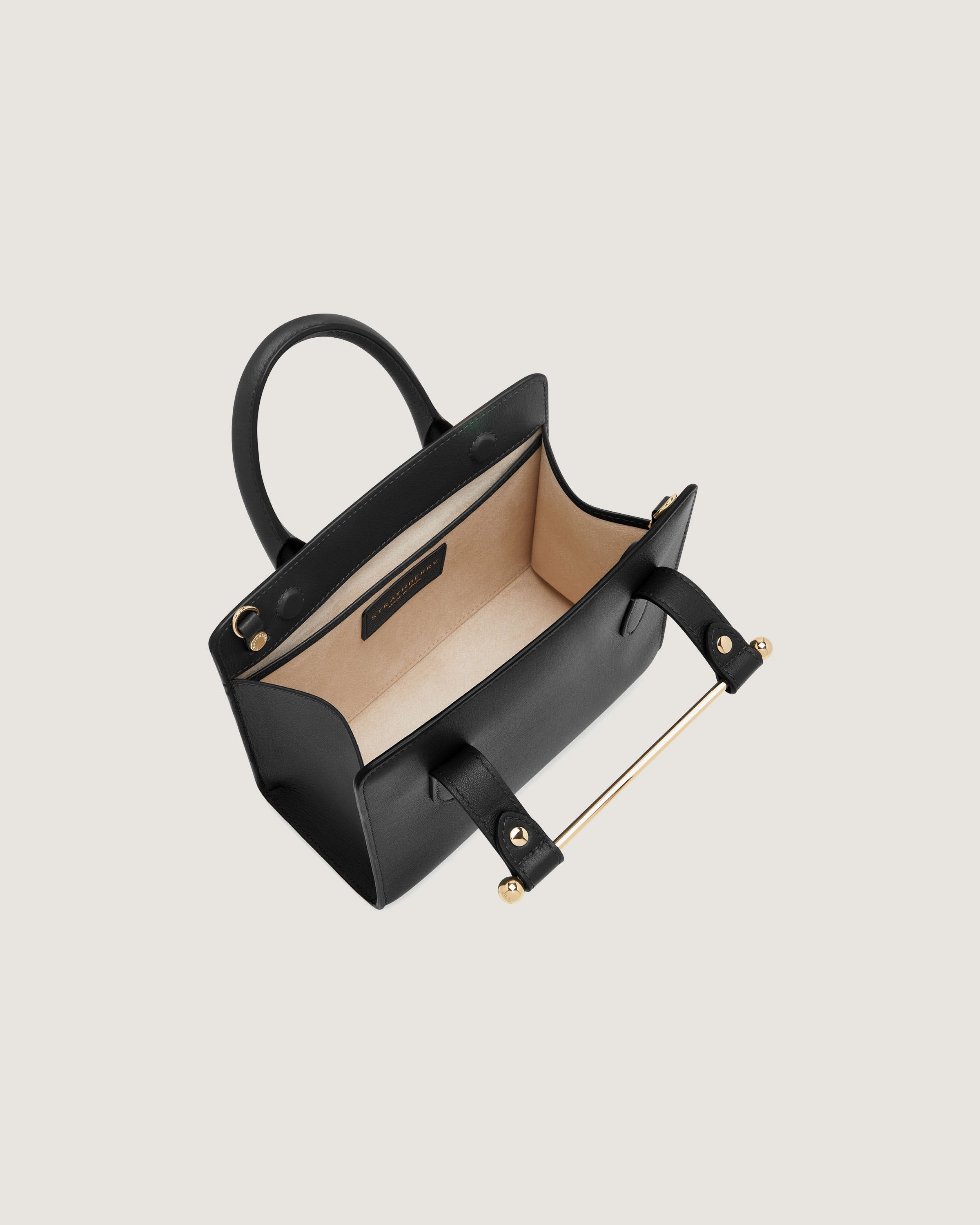 A small black handbag with a handle