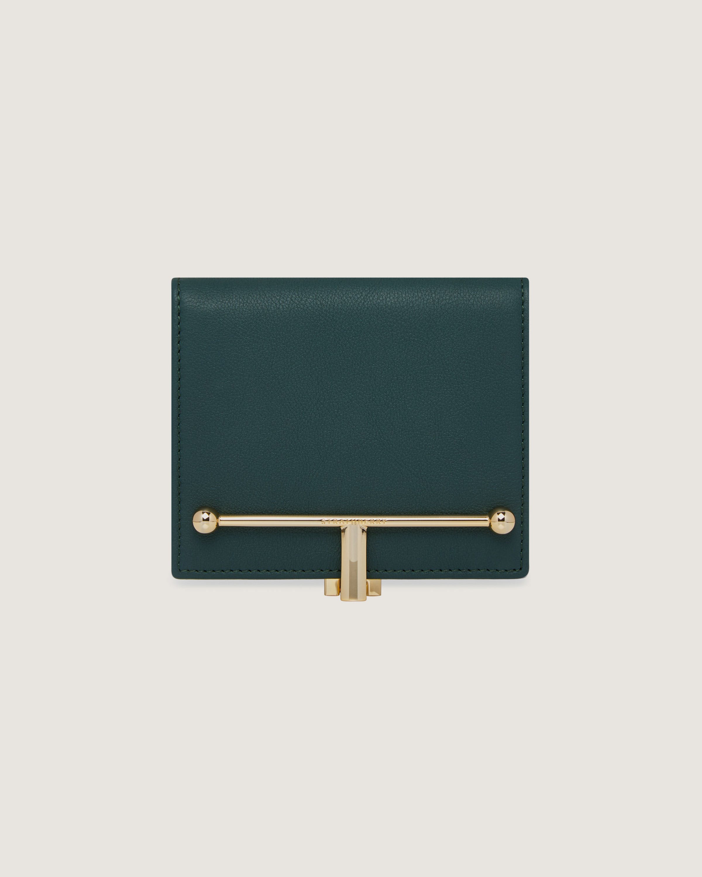 A green leather wallet with a gold handle