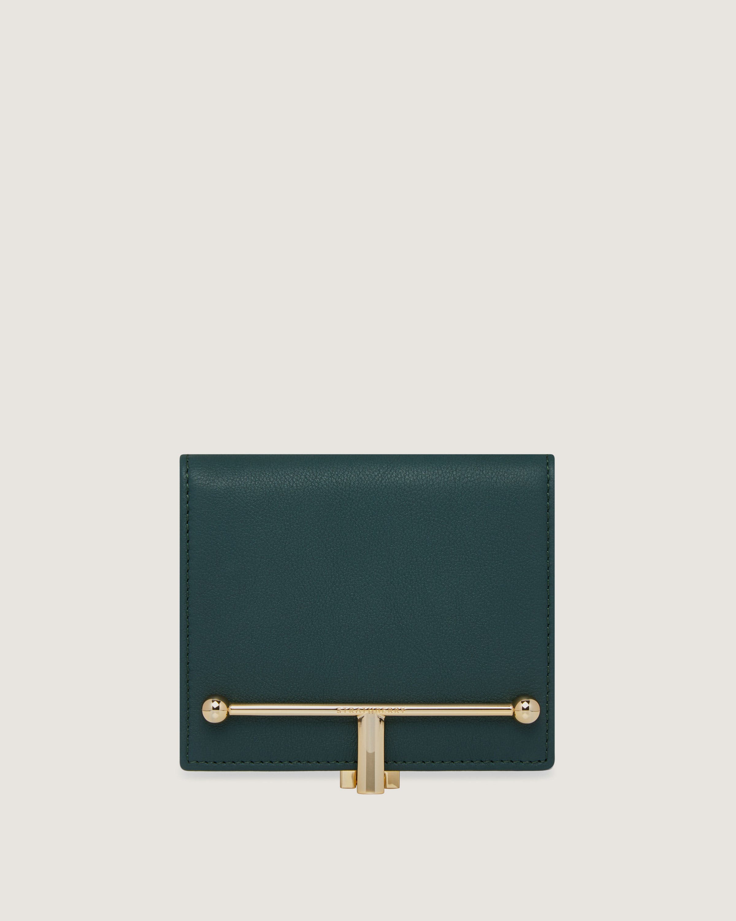 A green leather wallet with a gold handle