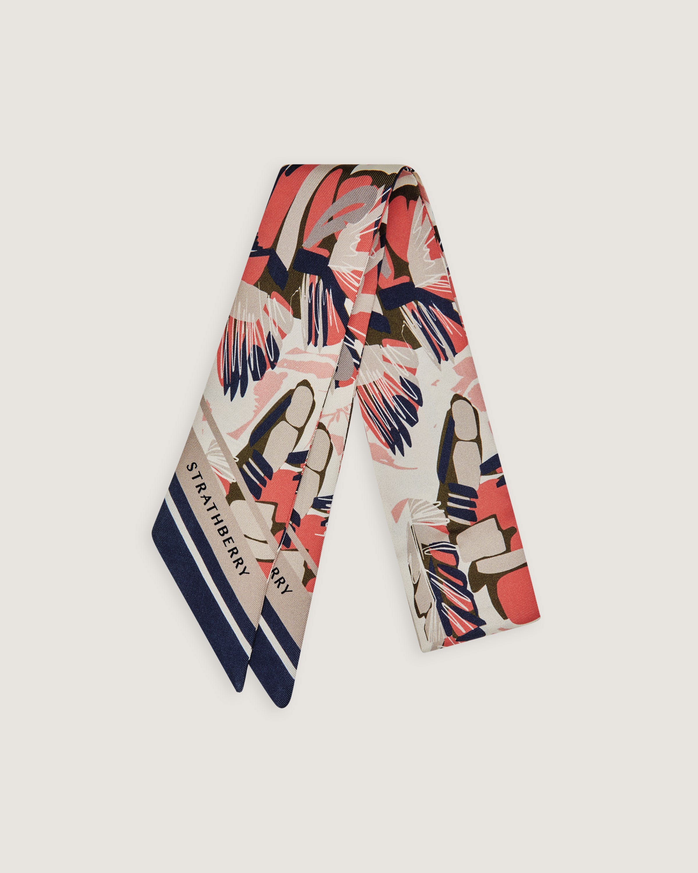 A scarf with a bird design on it