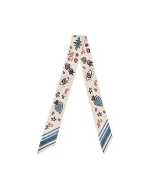 A white neck tie with blue and red designs