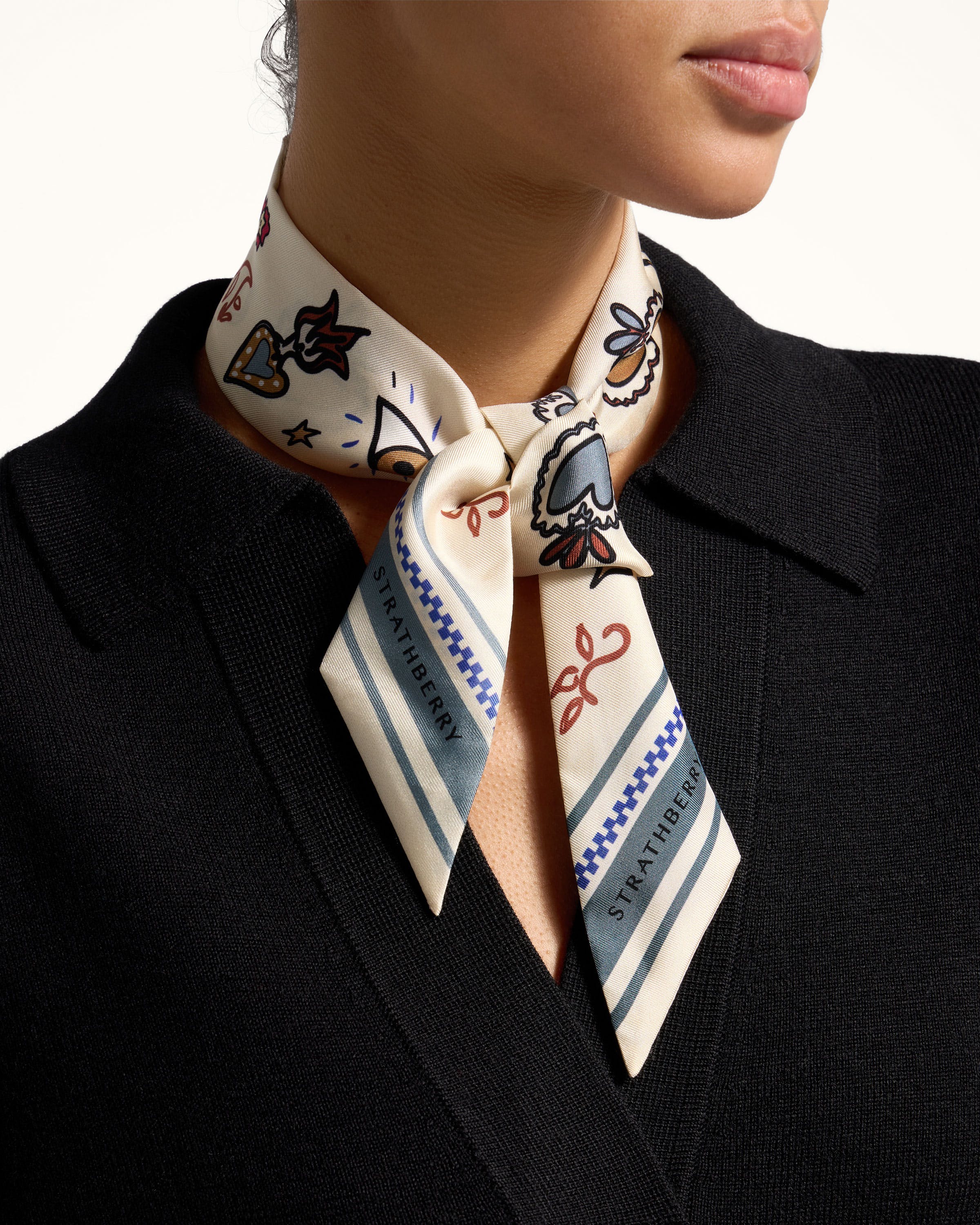 A close up of a person wearing a neck tie