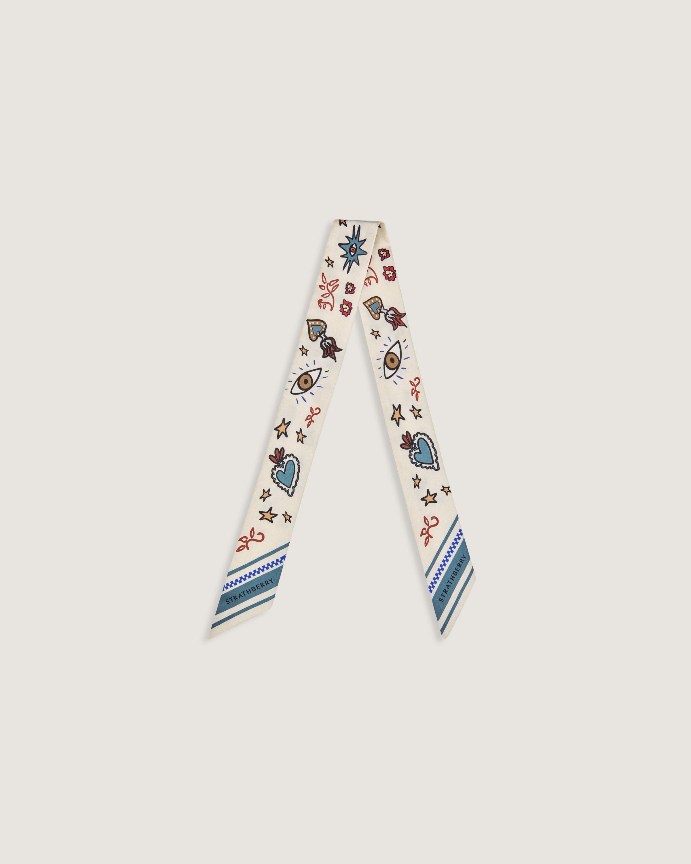 A white neck tie with a design on it