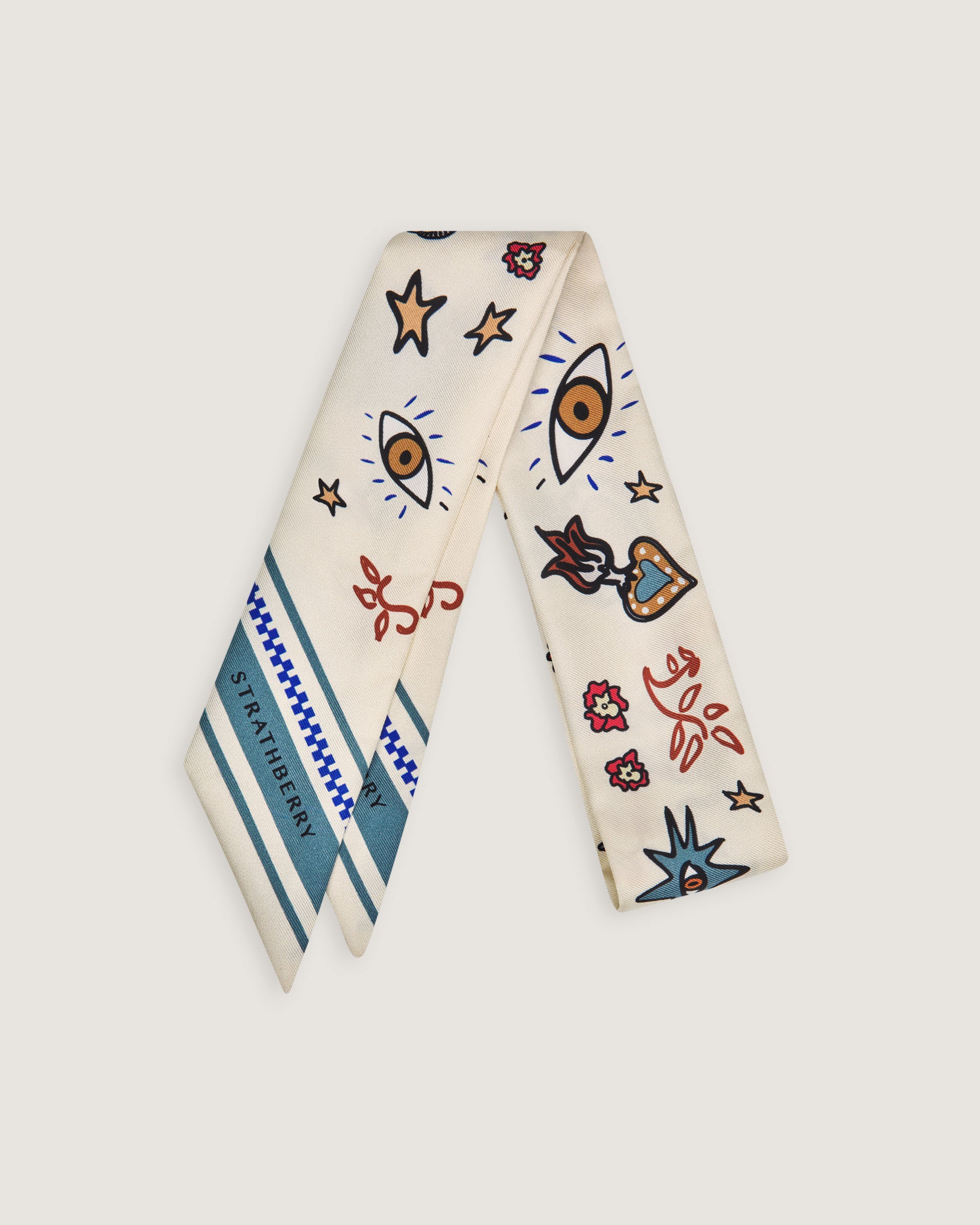 A white neck tie with a design on it