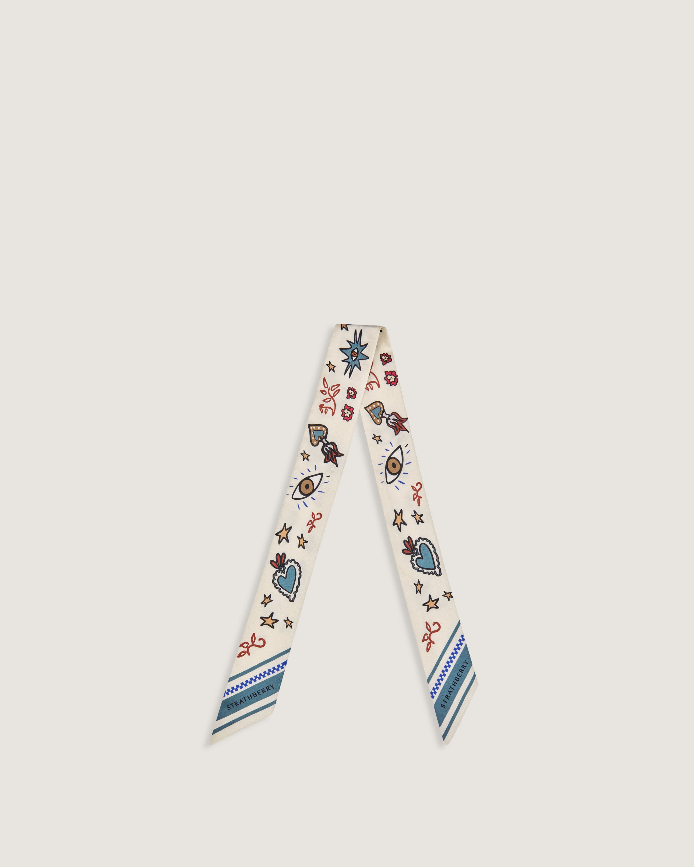 A white neck tie with a blue and white design