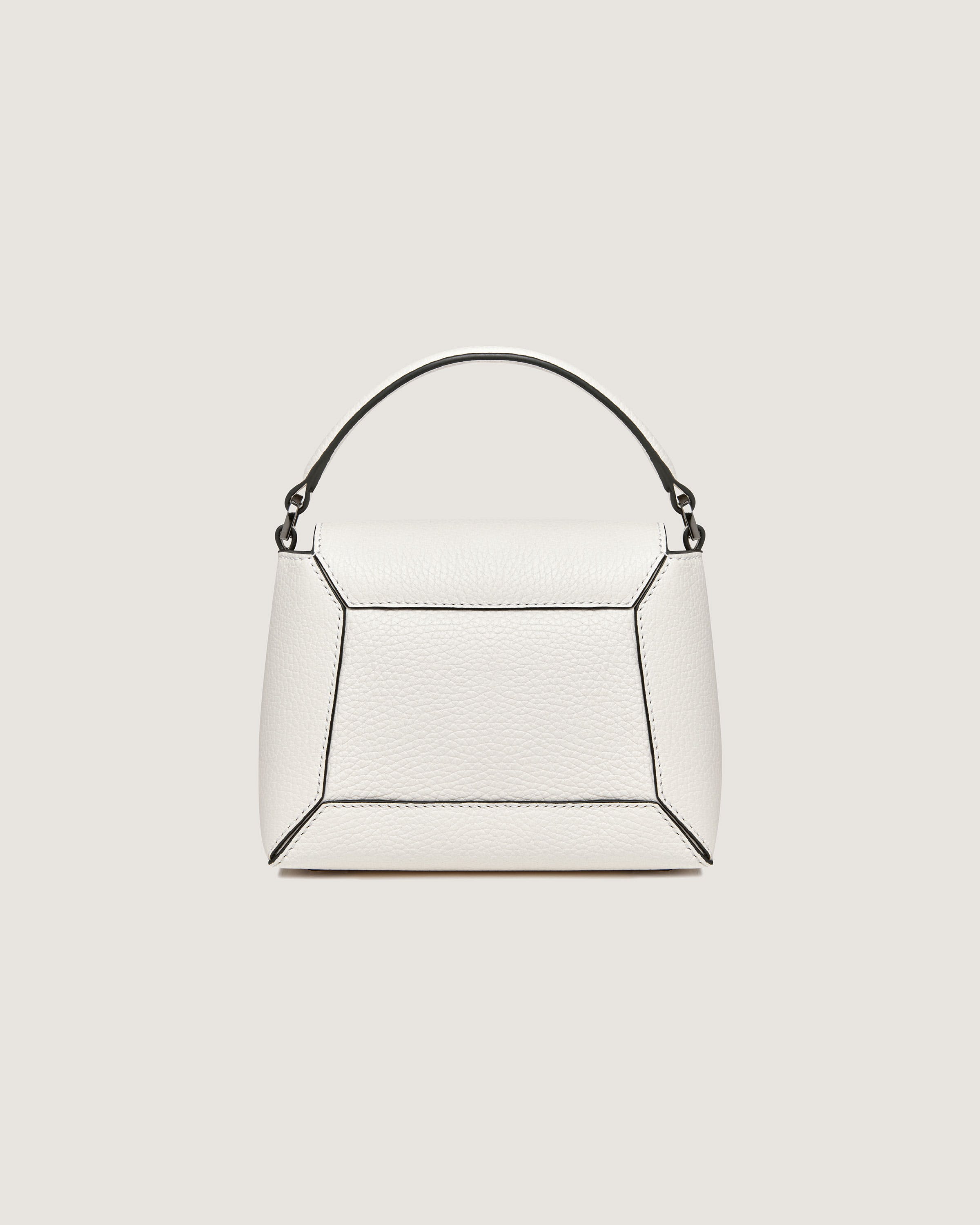 A white handbag on a white background