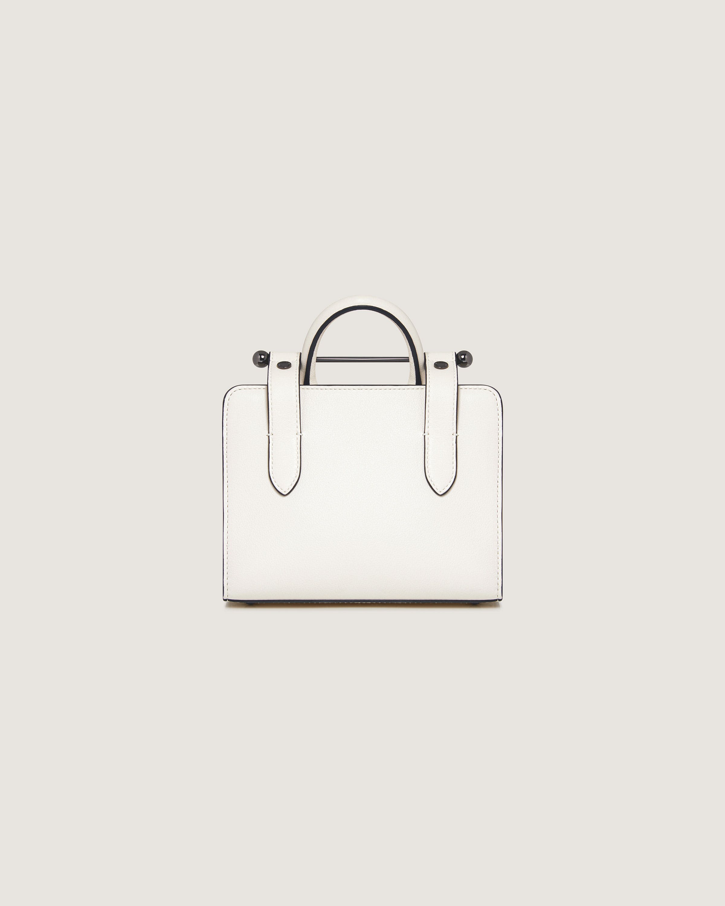 A white handbag on a white background