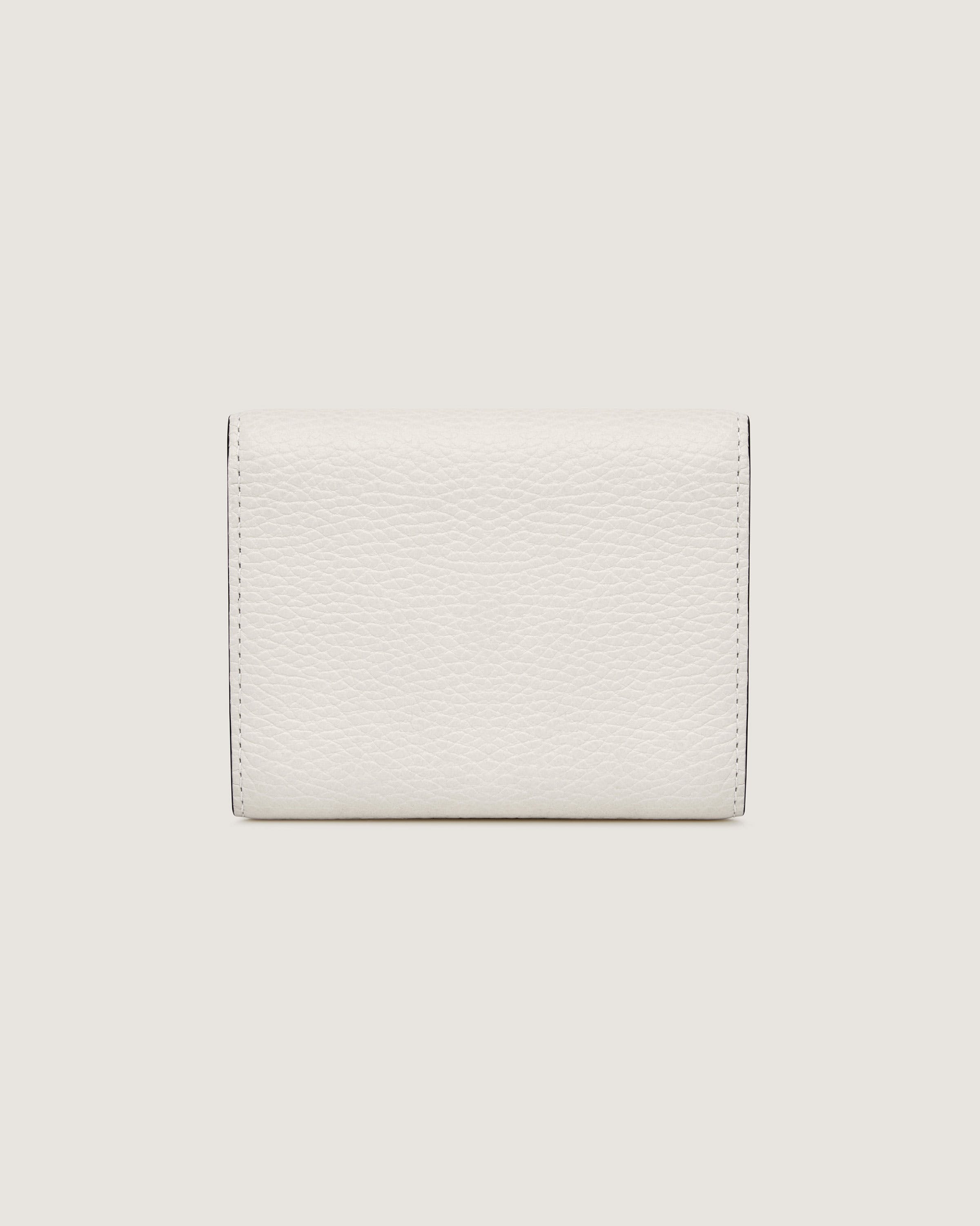 A white leather wallet on a white background