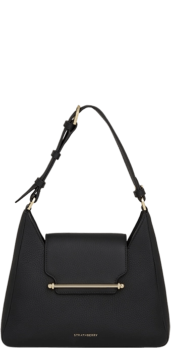 A black handbag with a gold handle