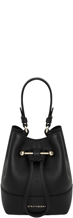 A black leather handbag on a white background