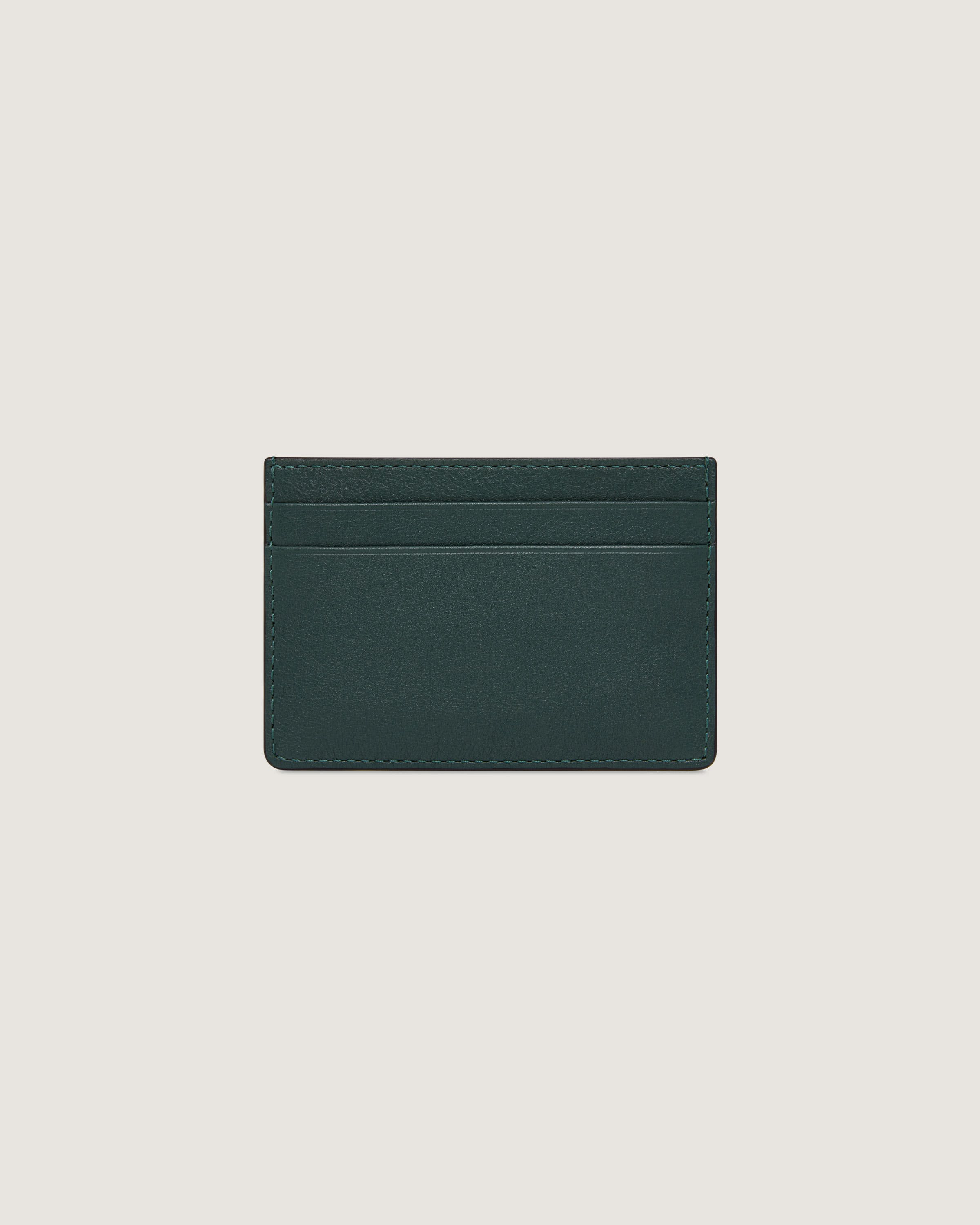 A dark green card holder with a white background