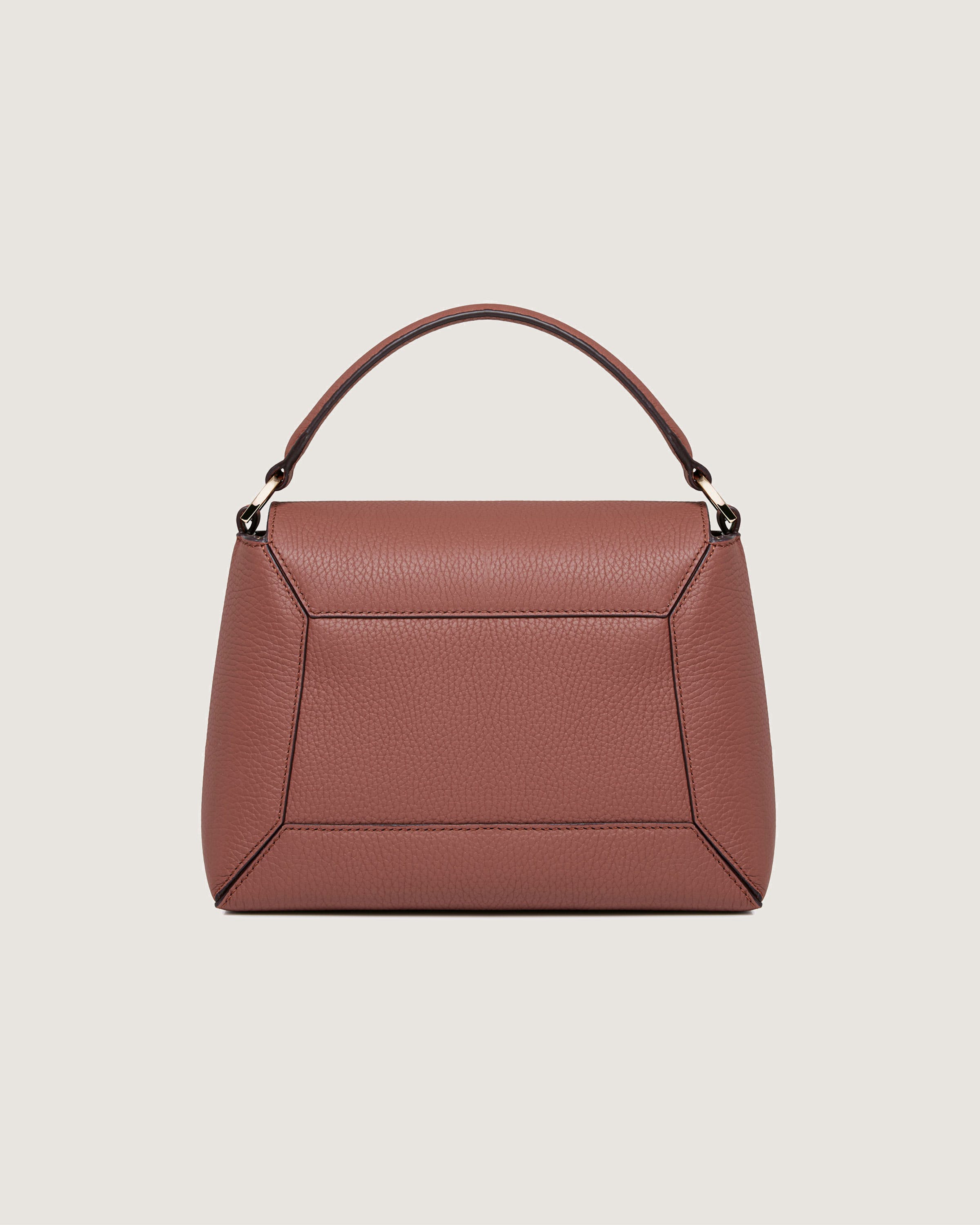 A brown handbag on a white background