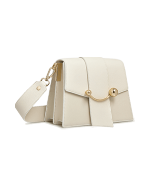 A white purse with a gold handle