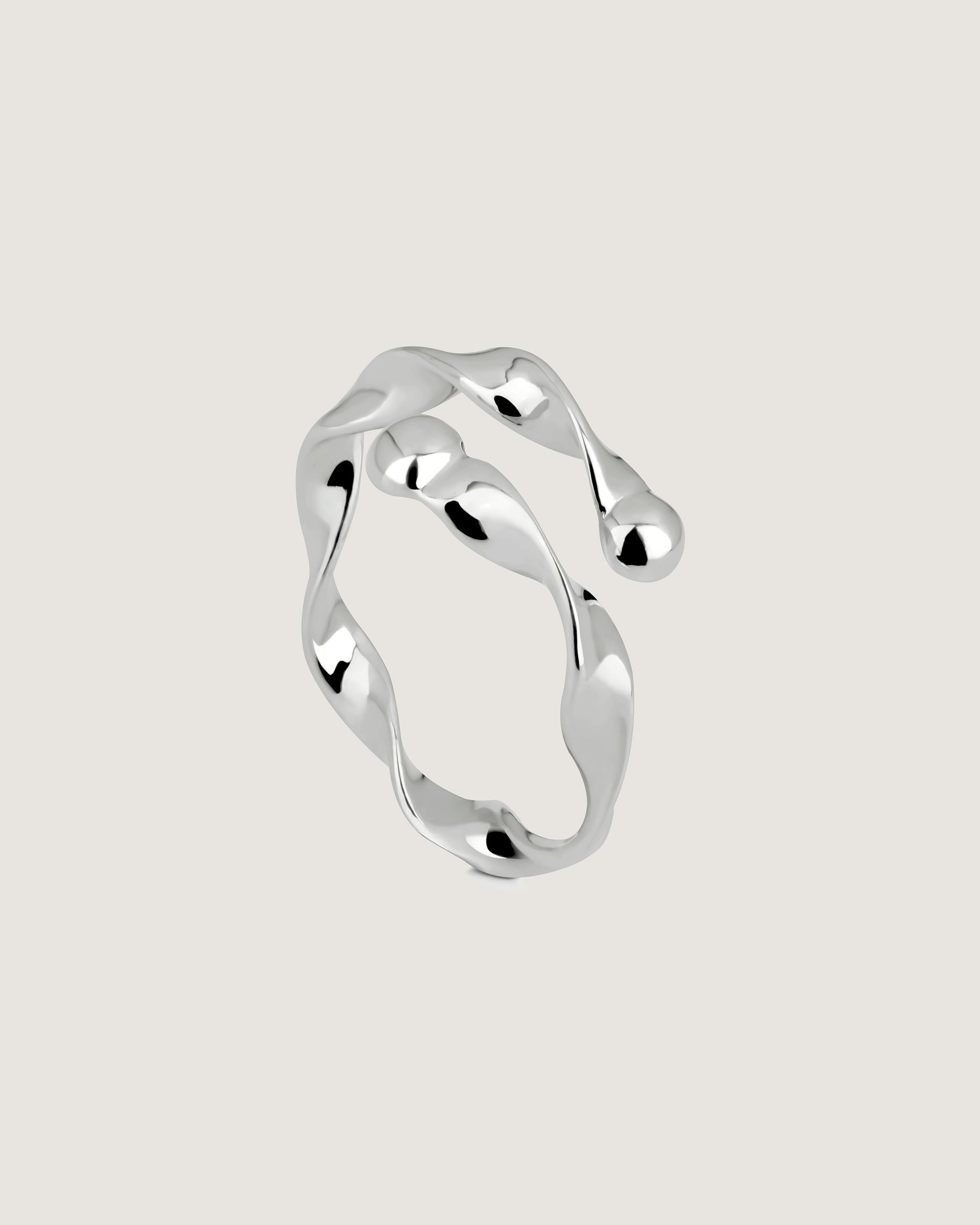 A silver ring on a white background