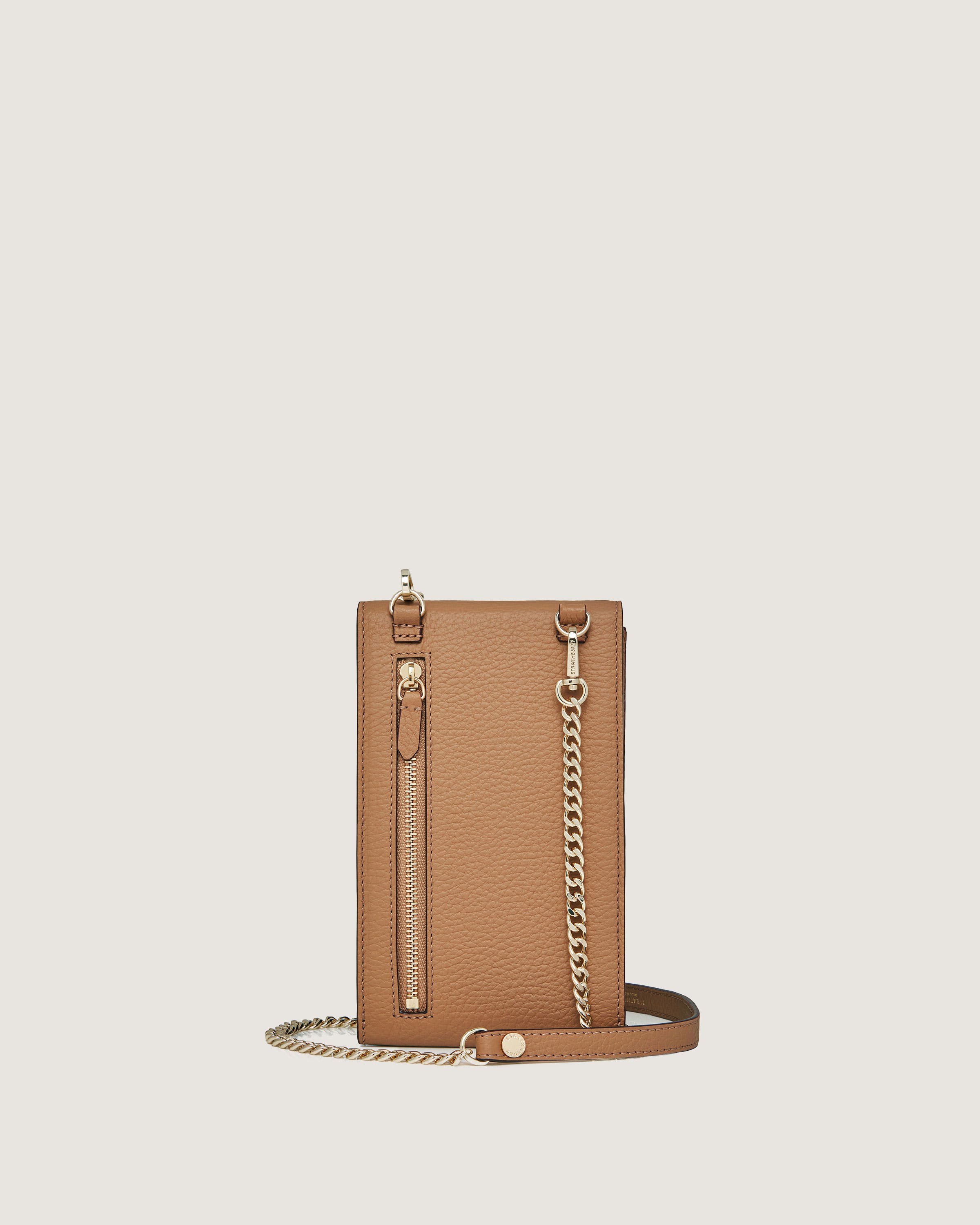 A tan cross body bag with a chain strap