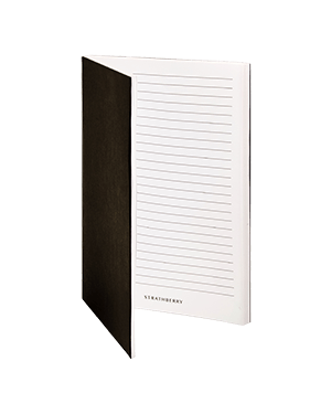 A black and white notebook with lined pages