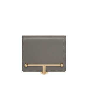 Stone grey wallet front with gold T-bar closure.