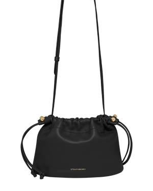 Black Strathberry Charlotte drawstring bag with adjustable shoulder strap and gold hardware.