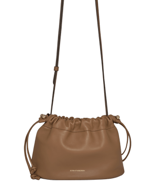 Strathberry Charlotte drawstring bag in clay leather with adjustable shoulder strap.