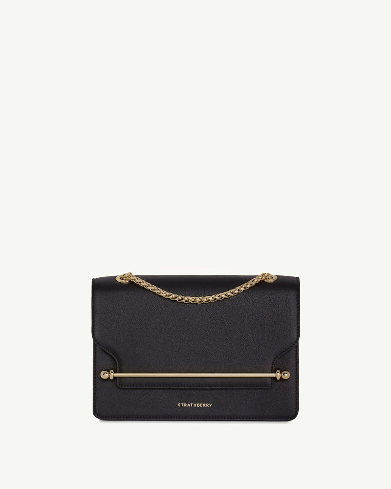 Black Strathberry East/West bag with gold chain and bar detail