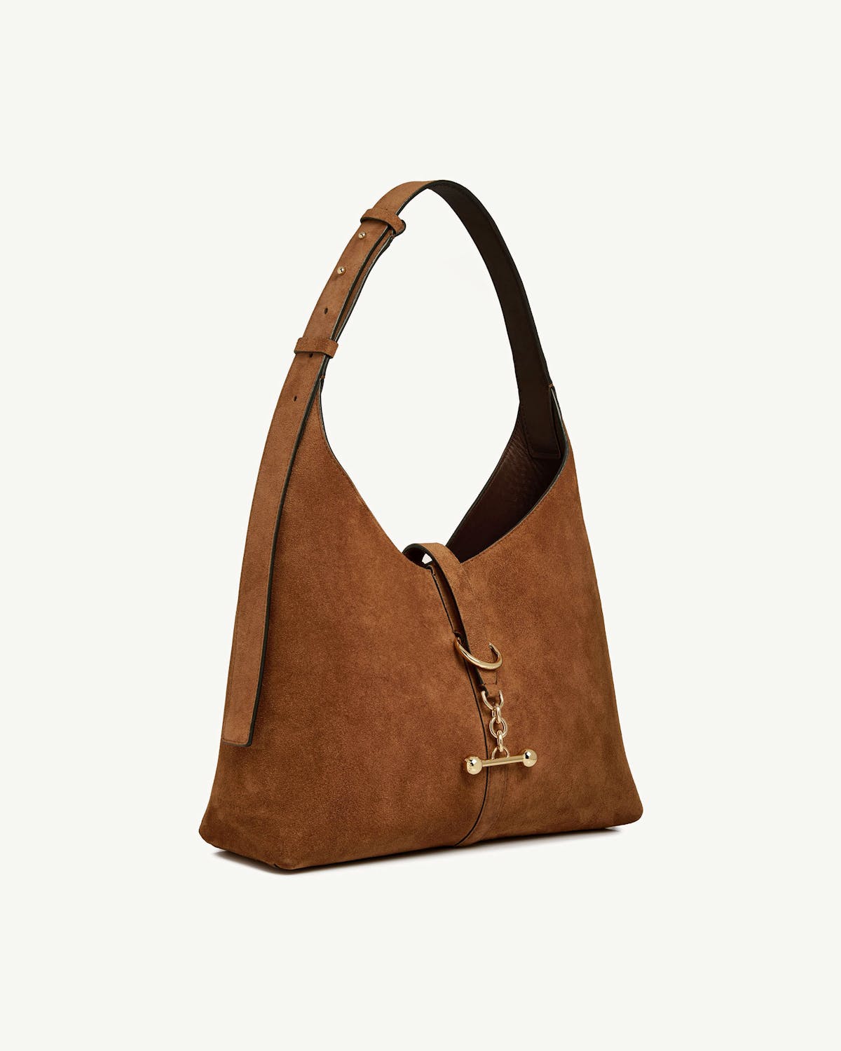 Tan suede kite hobo bag with single shoulder strap and gold bar hardware.