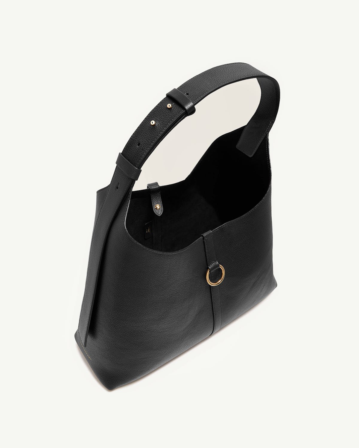 Black Kite Hobo Maxi bag in pebbled leather with gold ring detail.