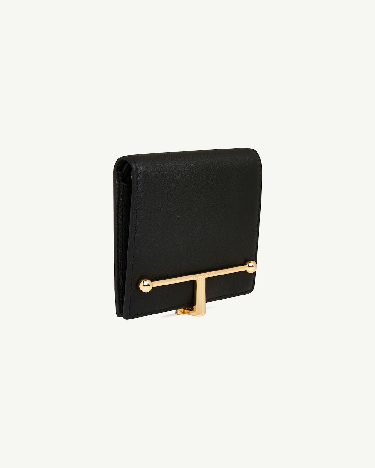 Black leather compact wallet with gold T-bar closure