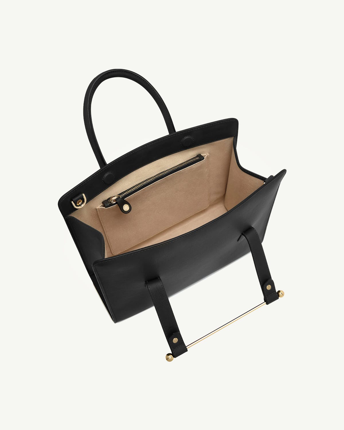 Black midi tote open top showing beige interior and zip pocket