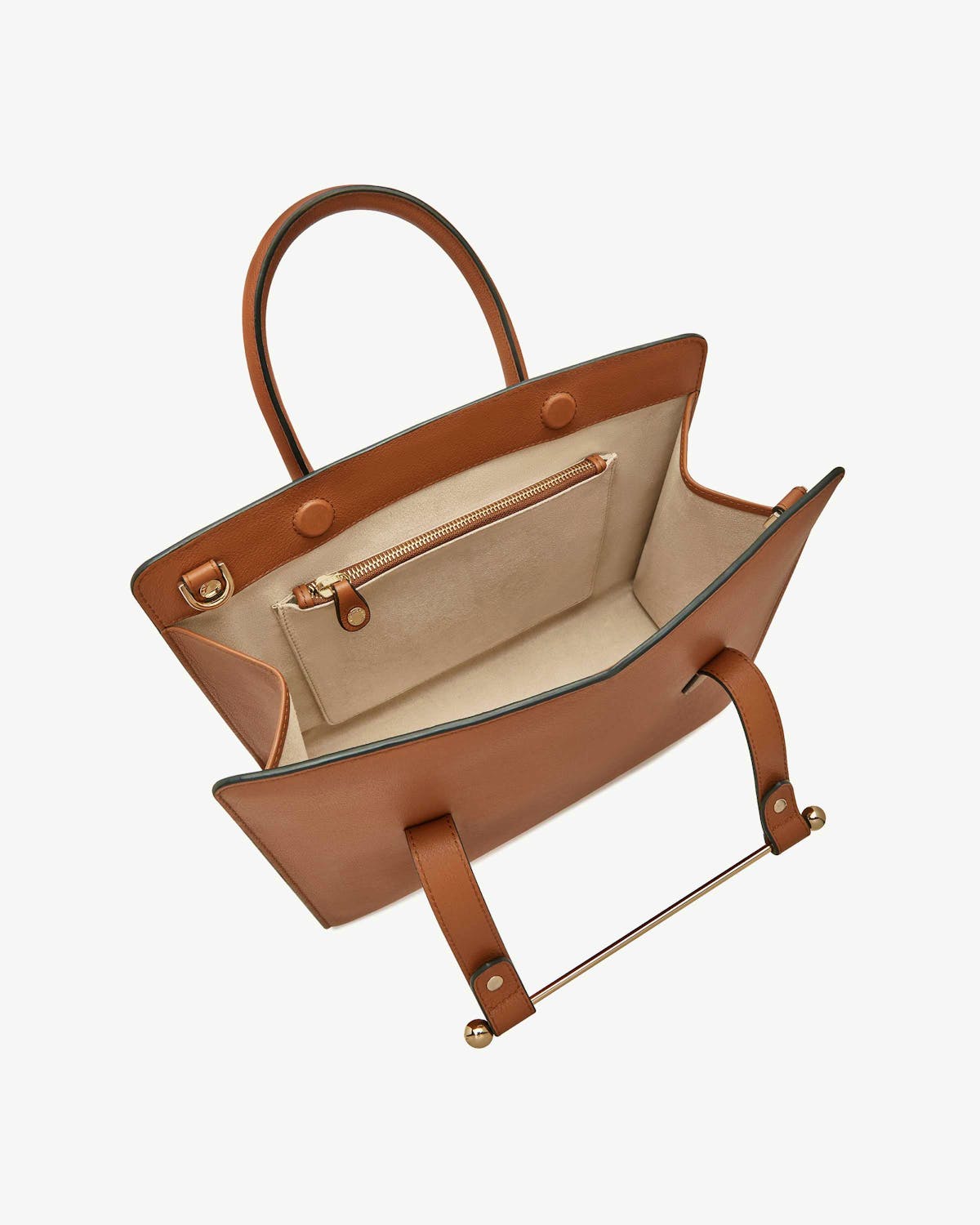 Chestnut midi tote open, beige interior with zip pocket and gold bar detail.