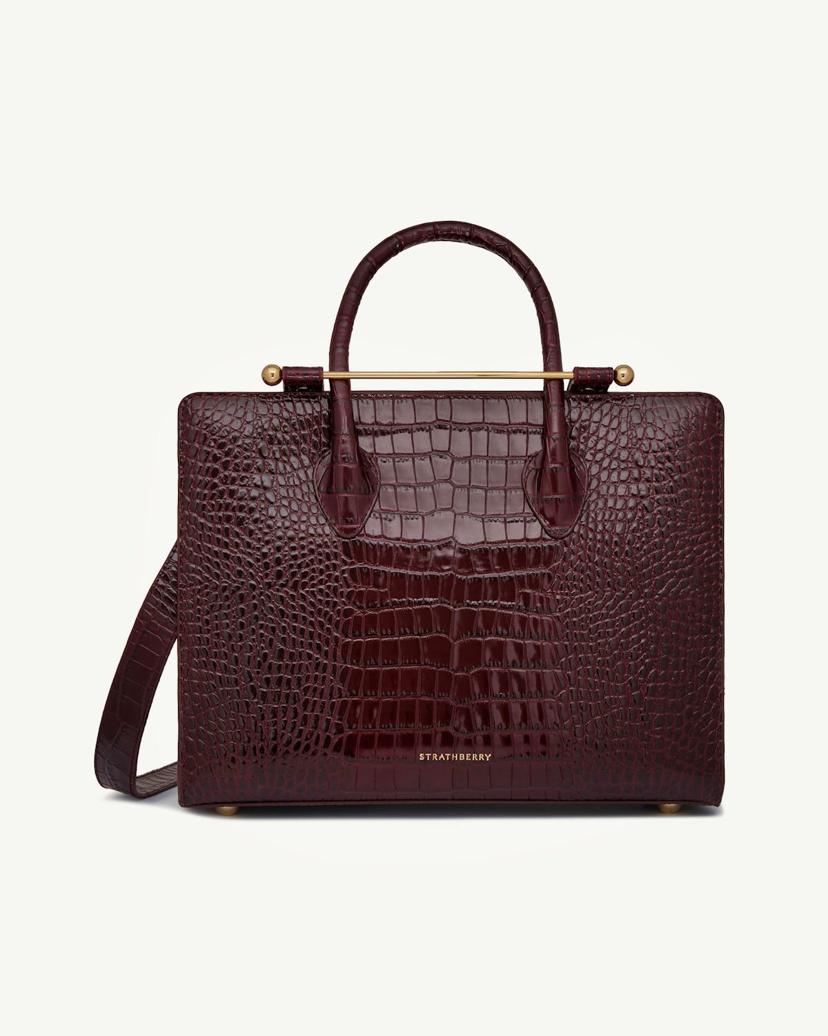 Strathberry croc midi tote in deep burgundy with top handle and shoulder strap