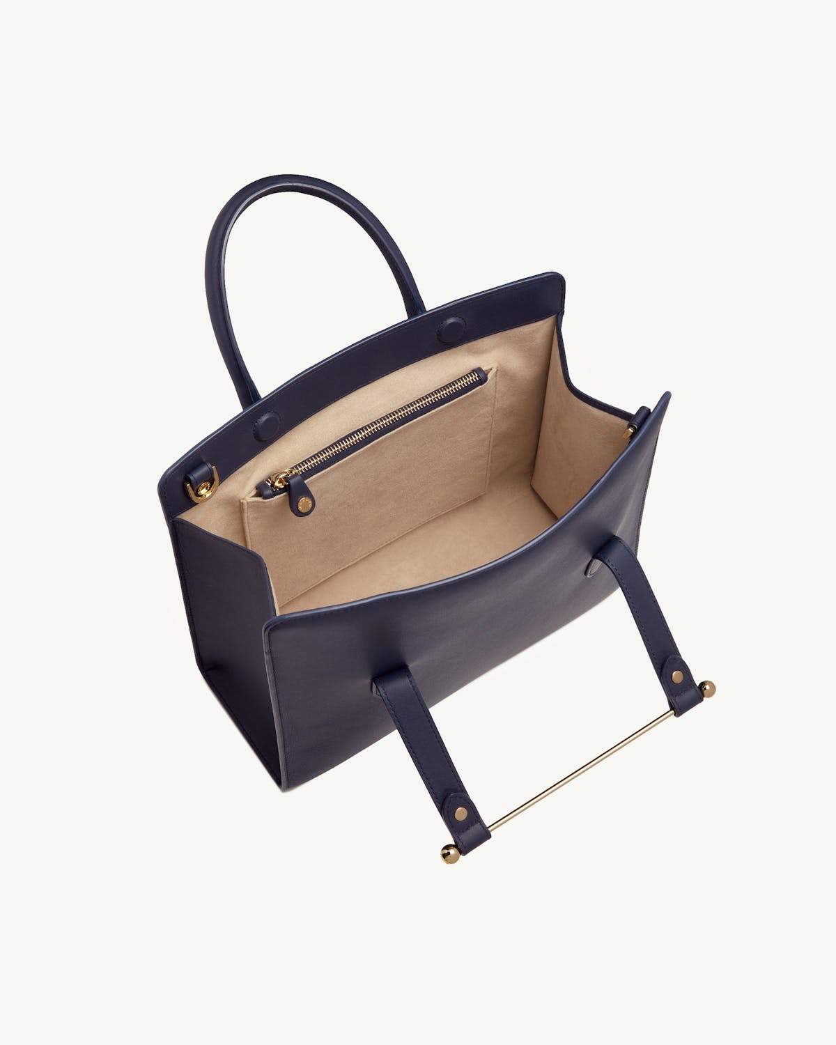 Marine blue midi tote open to show beige interior and zip pocket