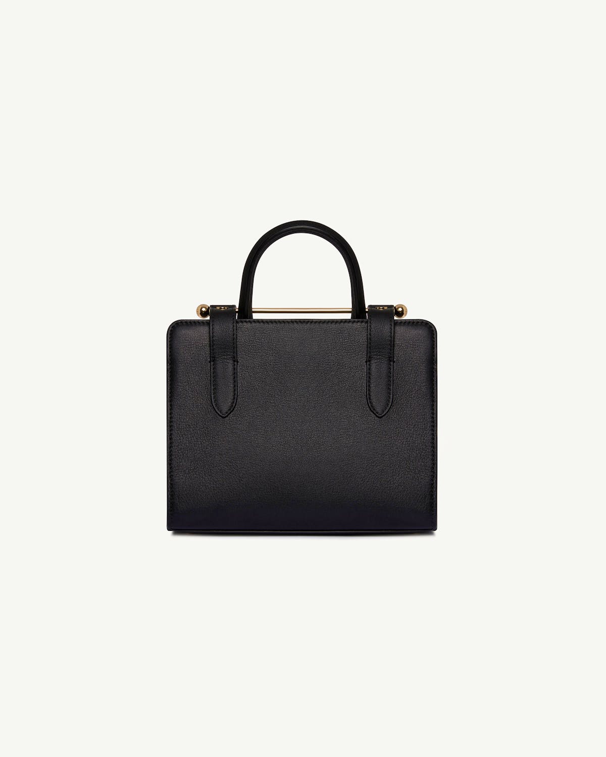 Black mini tote bag with top handles and gold bar detail.