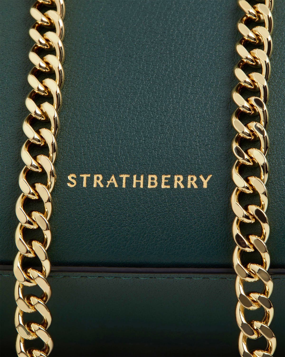 Strathberry bottle green mini tote front with gold chain straps