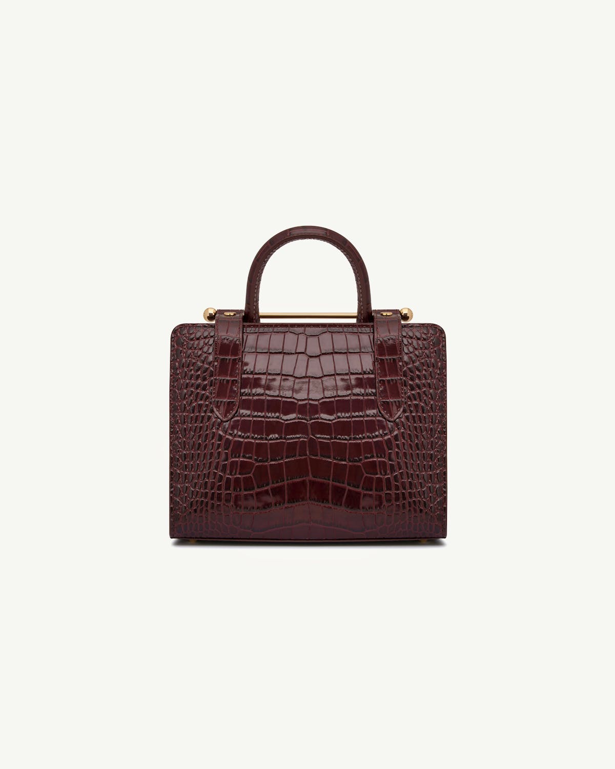 Croc-effect burgundy mini tote with top handles and gold bar detail