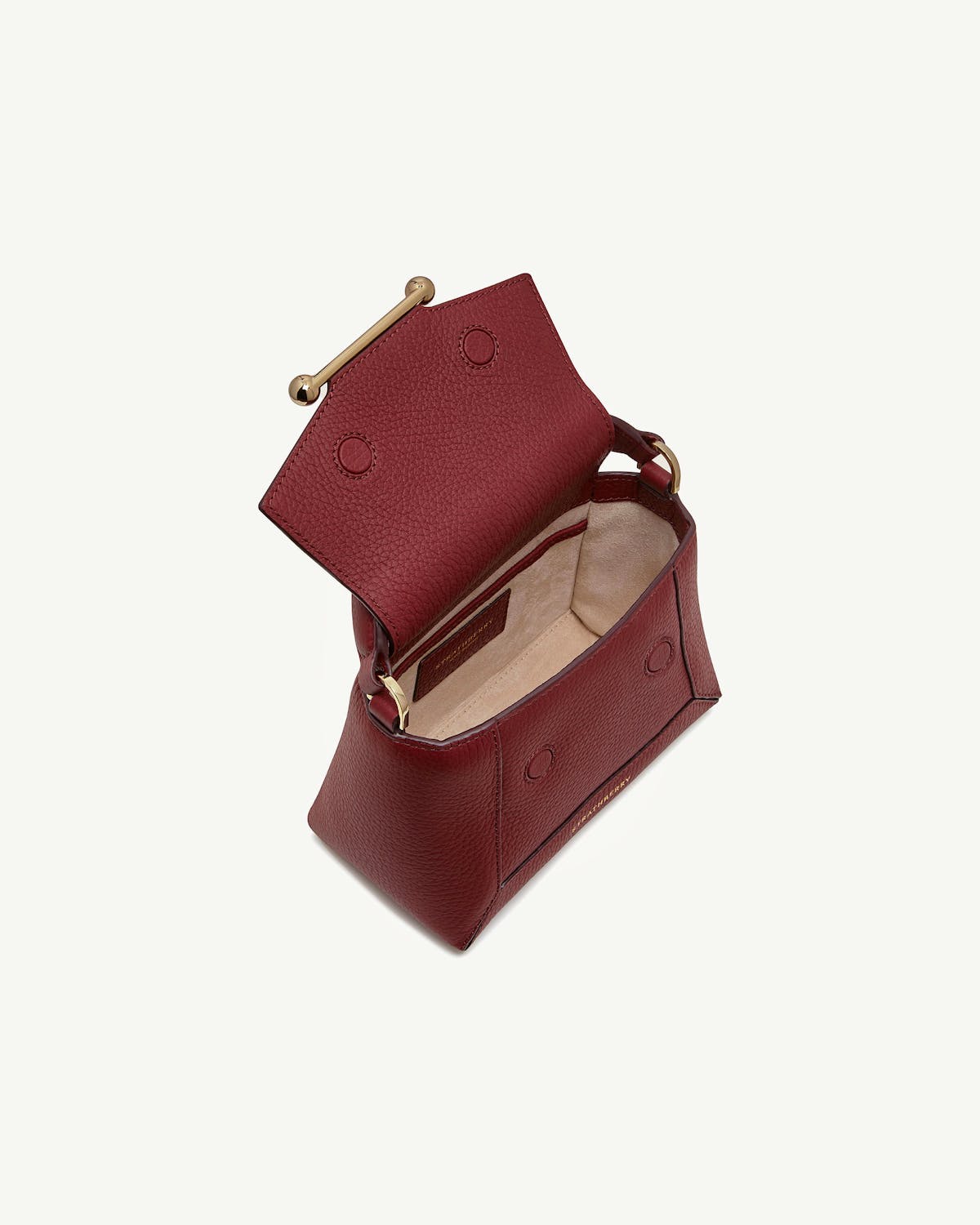Strathberry Mosaic Nano bag in oxblood with open top showing interior