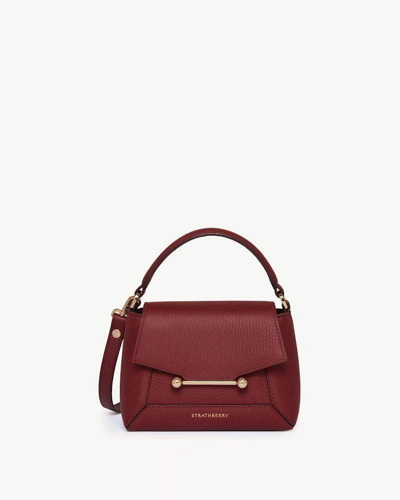 Strathberry Mosaic Nano bag in oxblood, front view on white background.