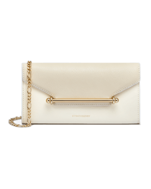 Strathberry Multrees chain wallet in vanilla and diamond leather with gold bar.