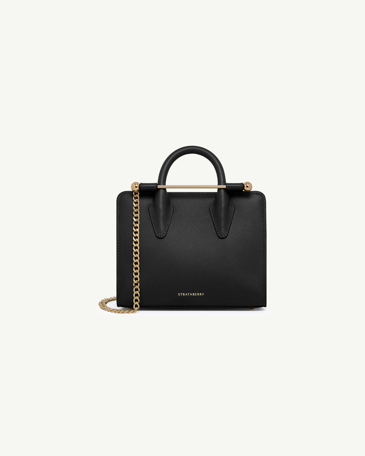 Strathberry black nano tote with gold bar detail and chain strap