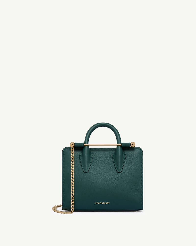 Strathberry bottle green nano tote with gold chain and top handle.