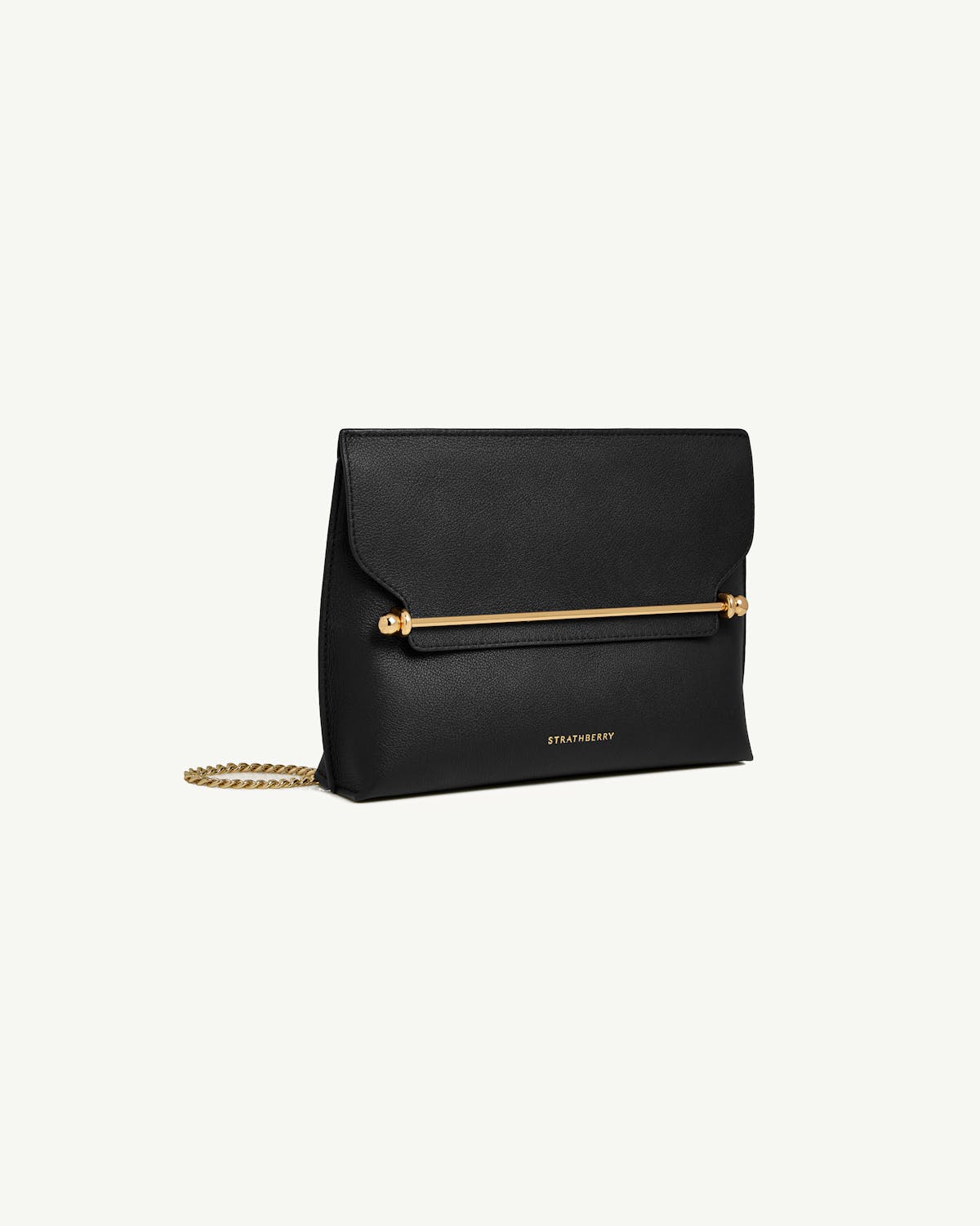Black Strathberry Stylist bag with gold bar detail and chain strap.
