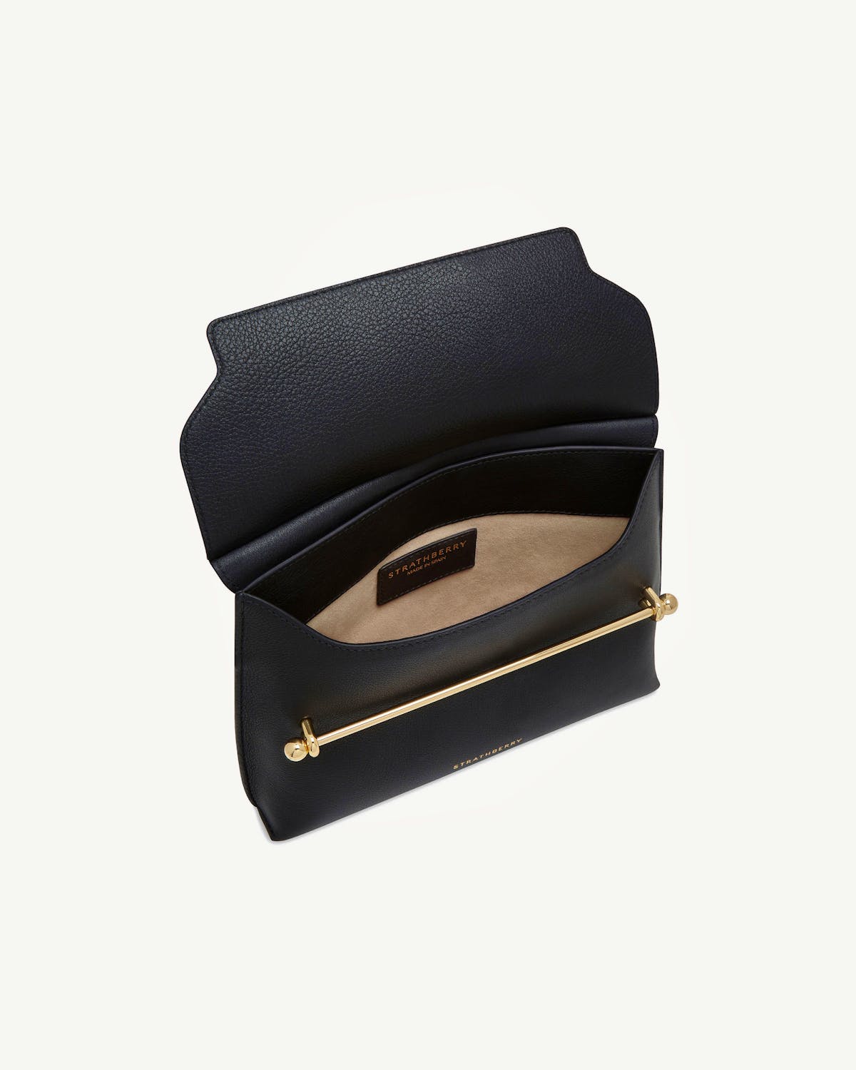 Black Strathberry Stylist bag open showing beige interior and gold bar