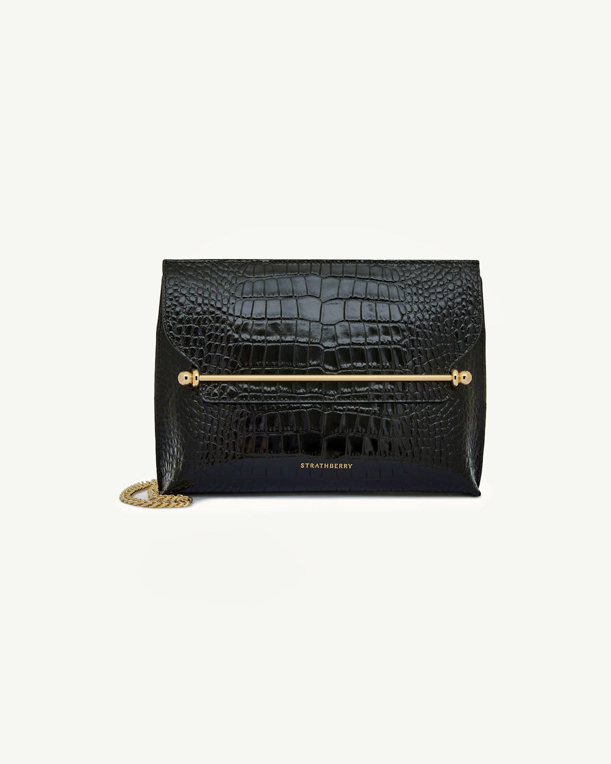 Strathberry Stylist bag in black croc with gold bar and chain strap.